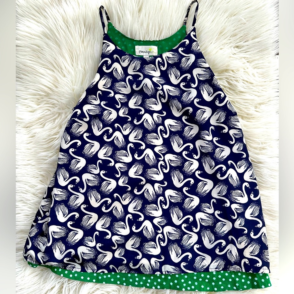 Anthropologie tank top. Size small. Blue swan print layered on Kelly green.